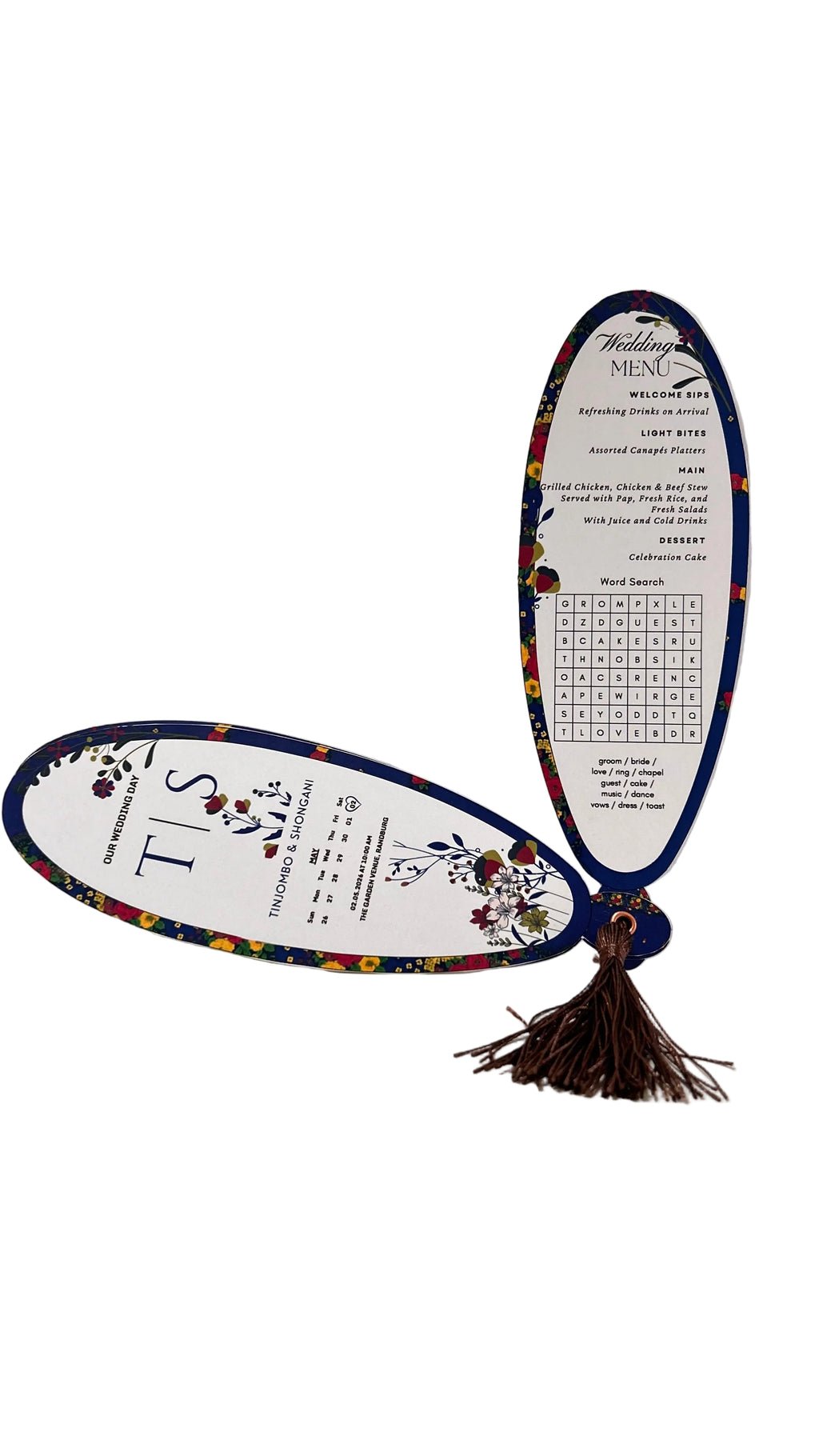 A decorative wedding menu card with a tassel, shown in two views: one flat displaying the dessert course and menu items, and one standing upright showing the main course details. The menu has a white background with blue borders, colorful floral accents, and a dark brown tassel.