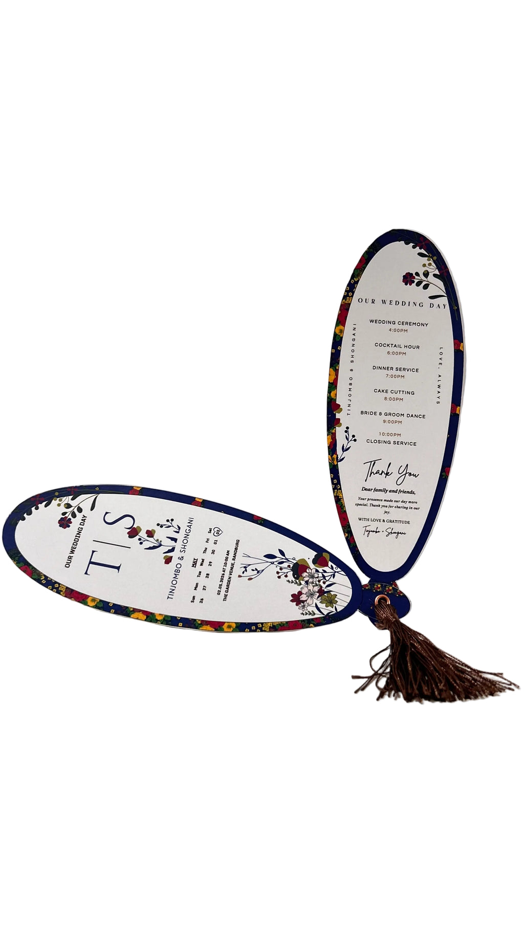 A wedding program bookmark shaped like an oval bookmark with a tassel, featuring floral designs and printed text on a white background.