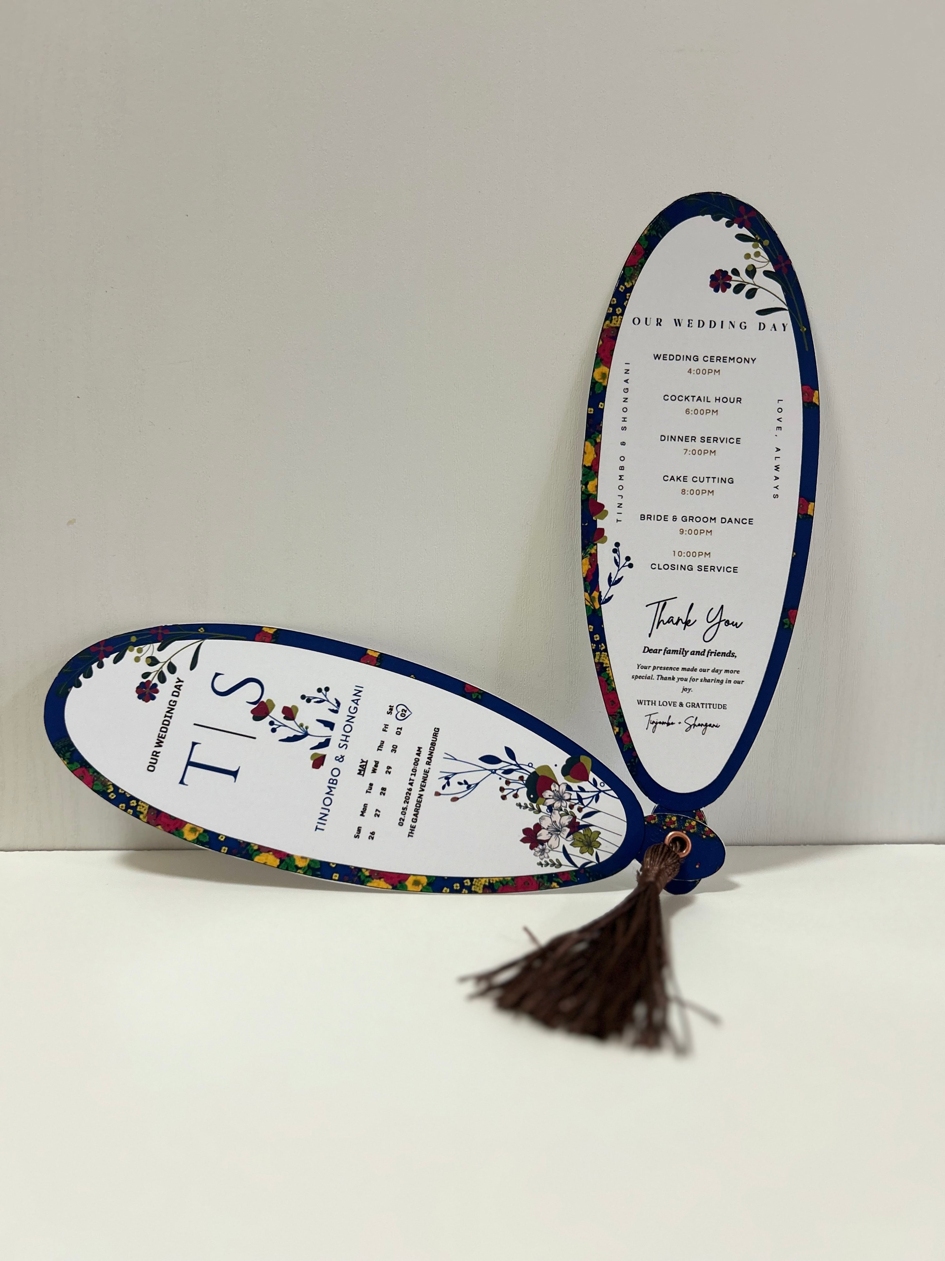 Luxury personalised wedding petal program fan with floral design and tassel in South Africa programme page