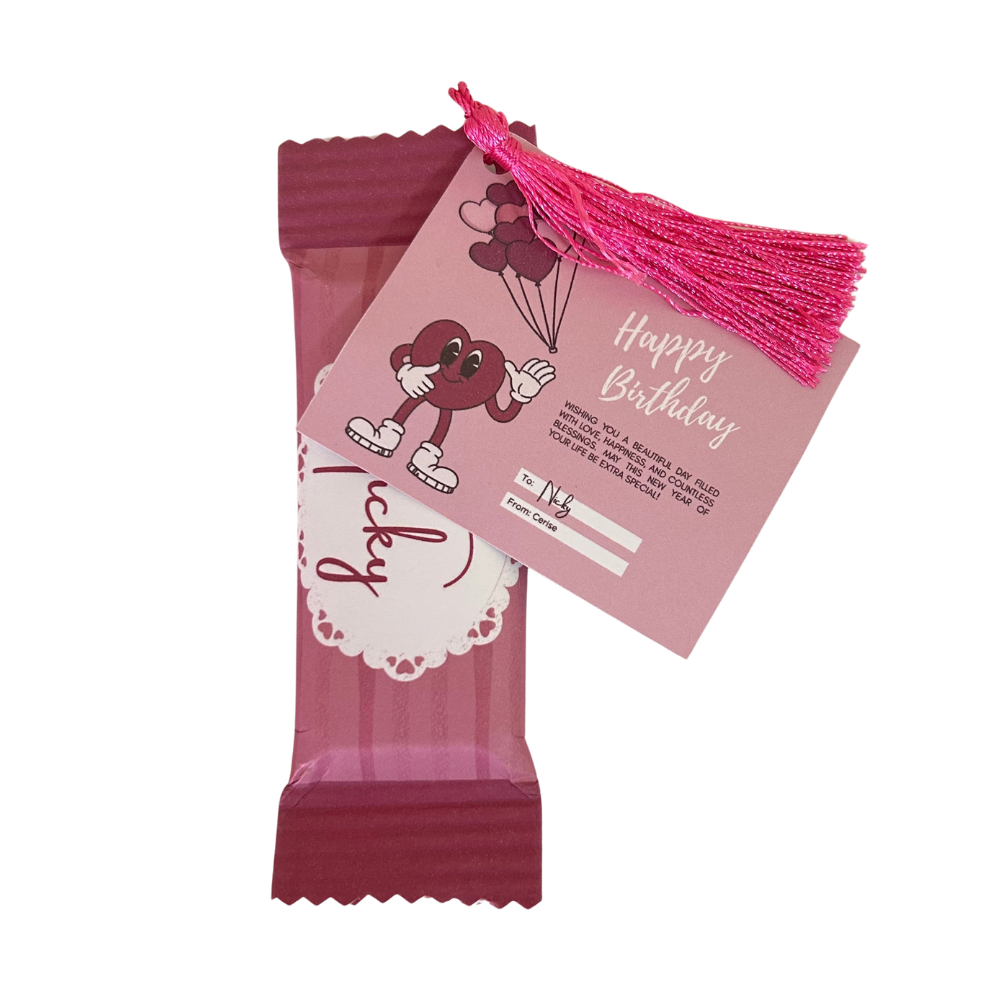 Pink personalised birthday chocolate with a matching gift tag, customised for birthday gifts and event favours.
