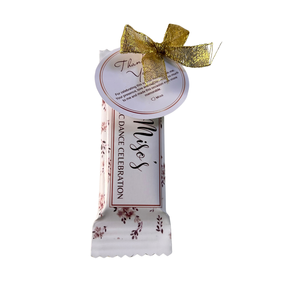 Personalised chocolate bar with decorative ribbon and custom message tag