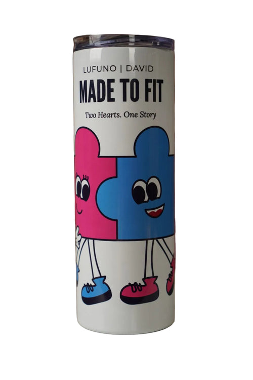 Tumbler with cartoon blue and pink puzzles design connected and personalised names on white background
